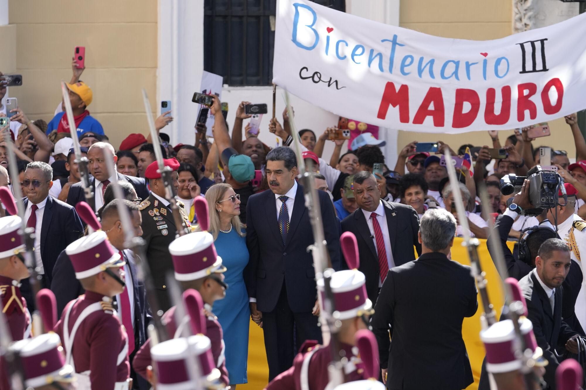 Venezuelan President Nicolas Maduro and his wife Cilia Flores arrive at the National Assembly for his swear-in ceremony for a third term in Caracas, Venezuela, Friday, Jan. 10, 2025. (AP Photo/Matias Delacroix) Associated Press / LaPresse Only italy and Spain. EDITORIAL USE ONLY/ONLY ITALY AND SPAIN