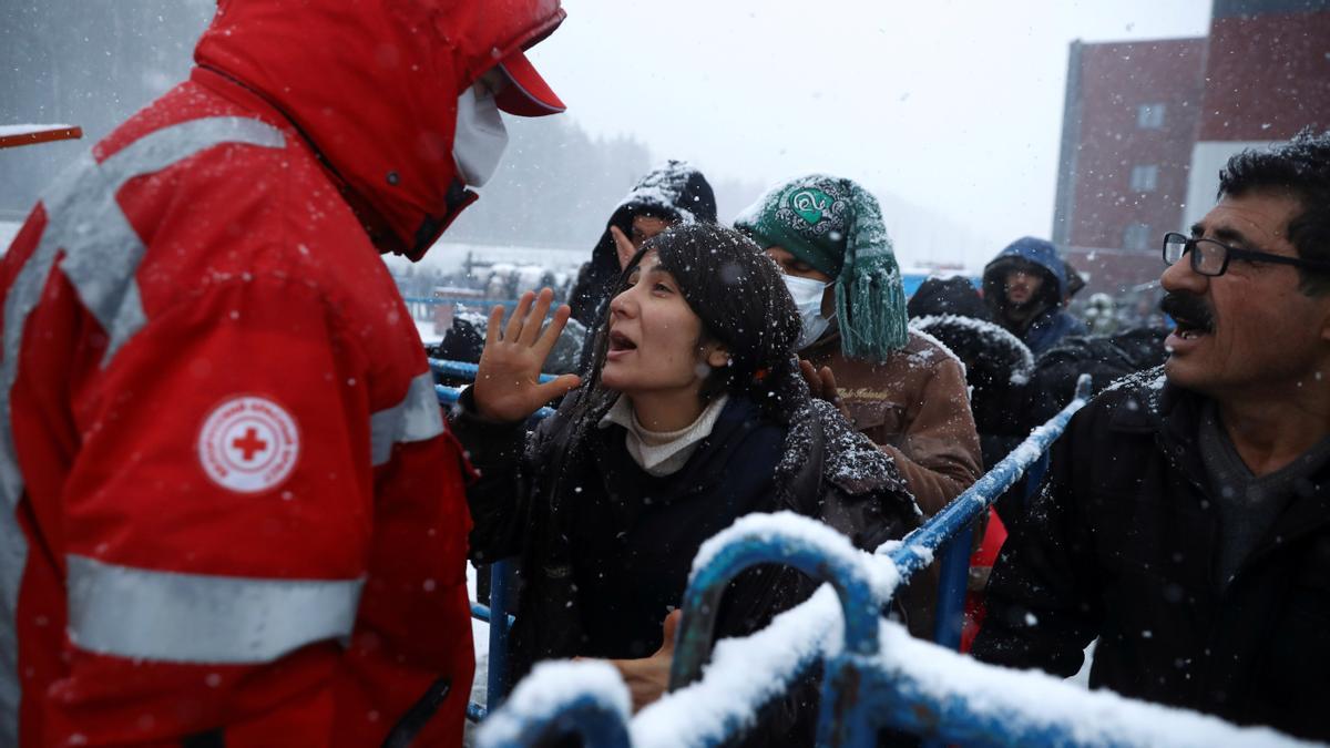 Migrants gather at a transport and logistics centre, near the Belarusian-Polish border, in the Grodno region, Belarus