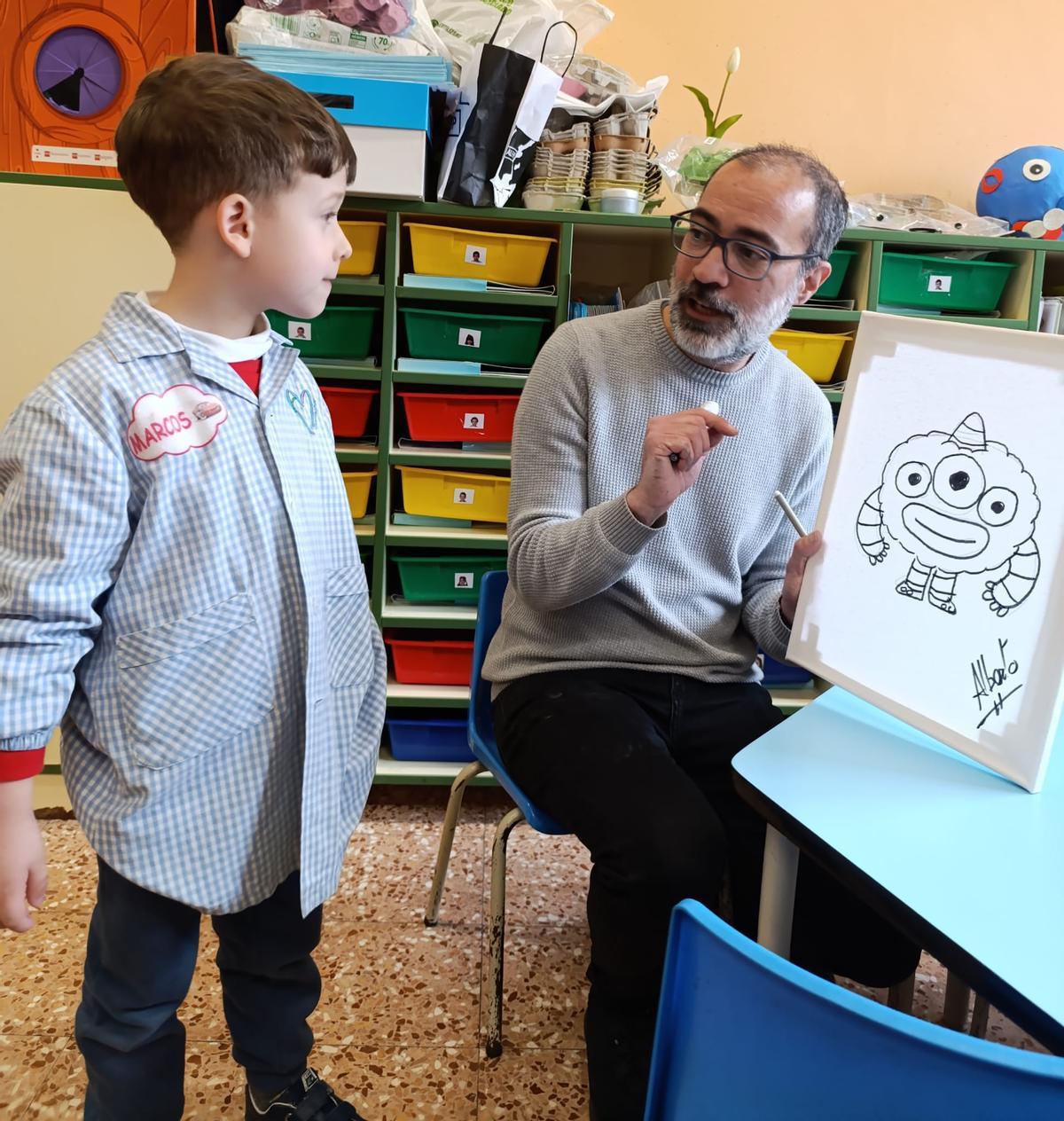 Un alumno, con el director de arte.