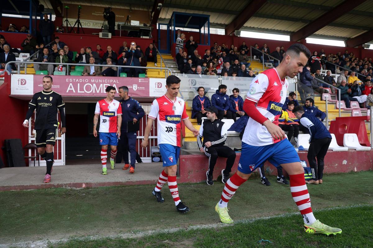 Las imágenes del duelo trascendental entre el Arosa y el Compostela Las imágenes del duelo trascendental entre el Arosa y el Compostela