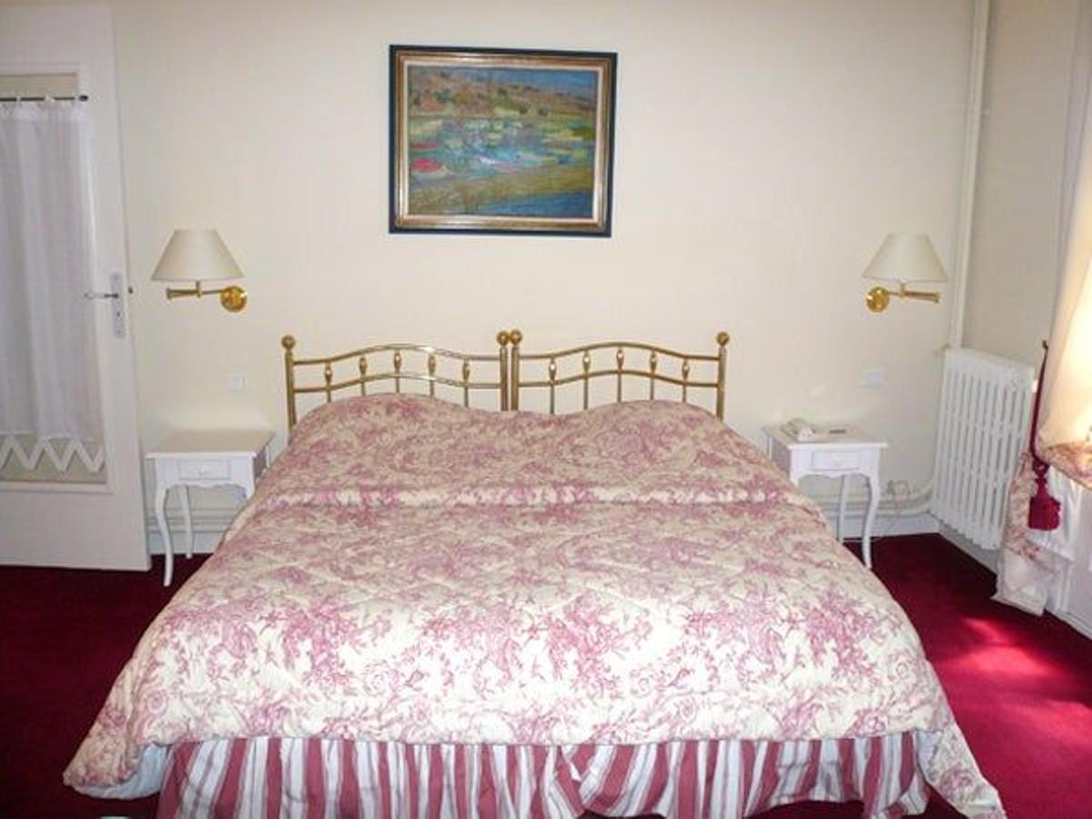 Dormitorio de la habitación clásica de  Le Domaine d&quot;Auriac