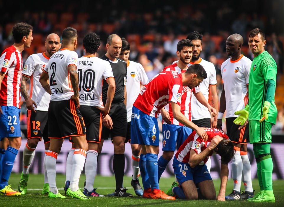 El partido entre el Valencia y el Sporting, en imágenes