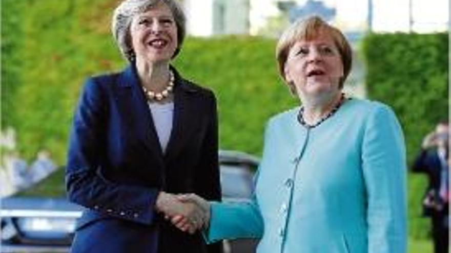 May i?Merkel van mostrar bona sintonia en la seva primera reunió.