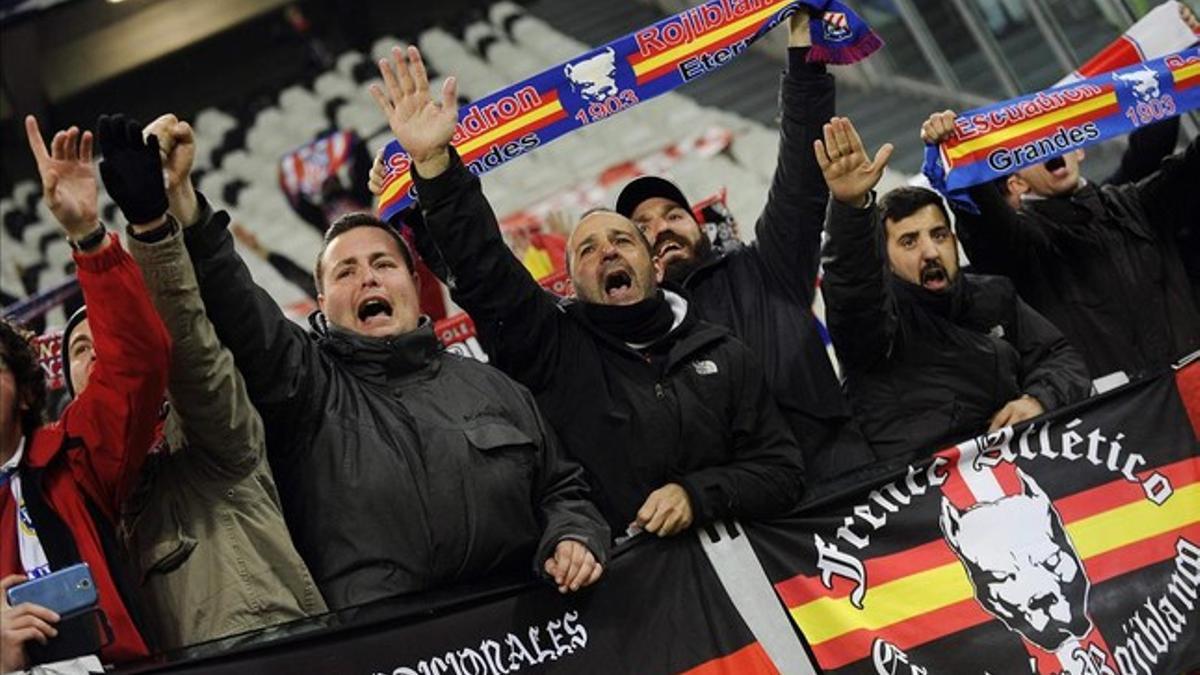rpaniaguaatletico madrid s supporters hold team scarfs befo141210163305