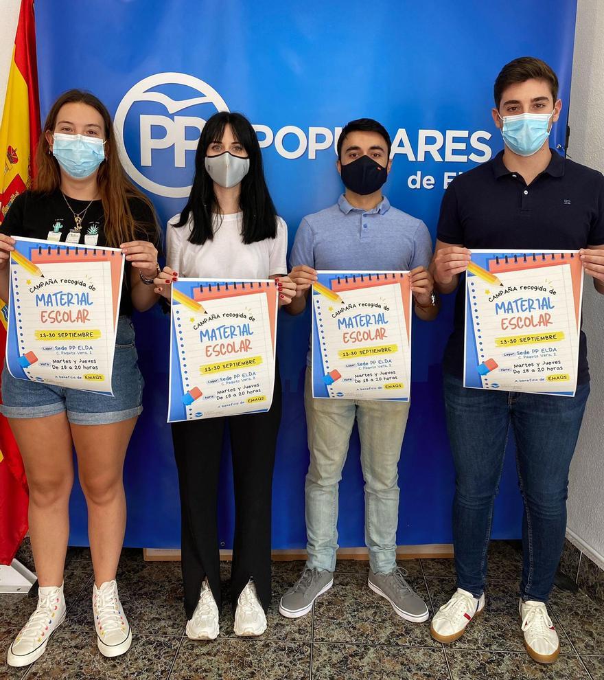 Jóvenes de NN GG de Elda durante la presentación de la campaña solidaria.