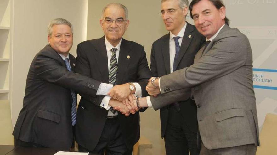 Firma del acuerdo de fusión de las cámaras en marzo pasado. // Xoán Álvarez