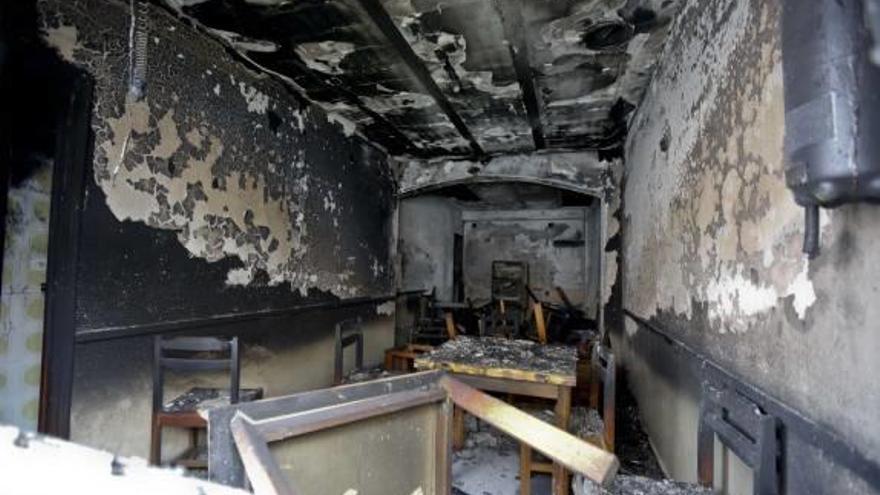 Estado del bar tras el incendio.