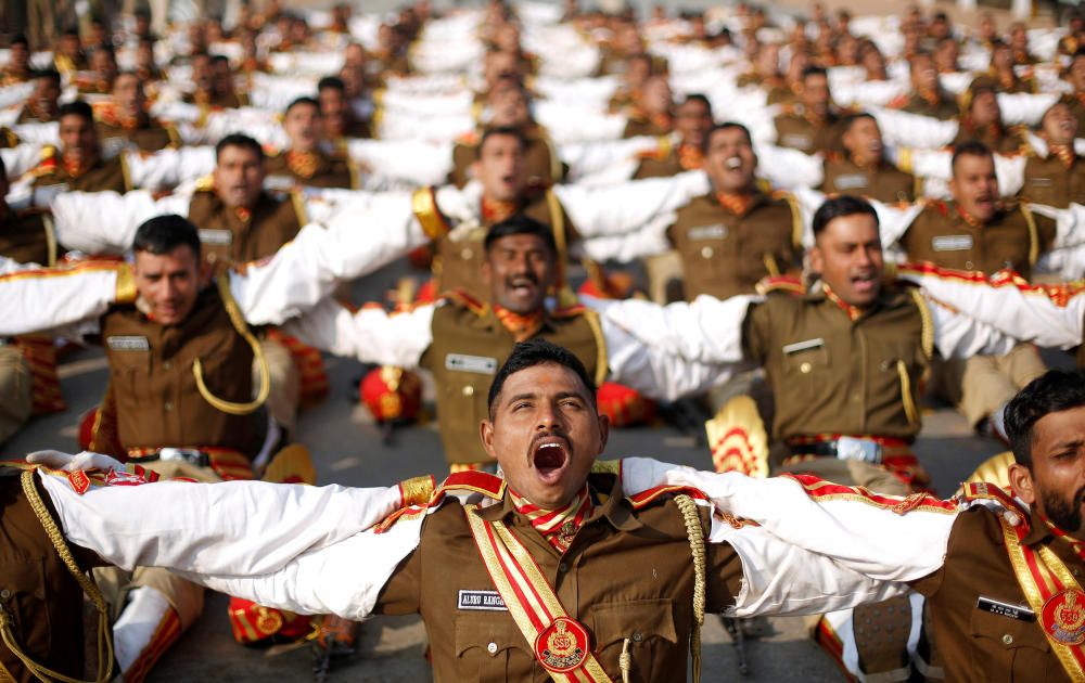 Indian soldiers take part in a laughter yoga ...