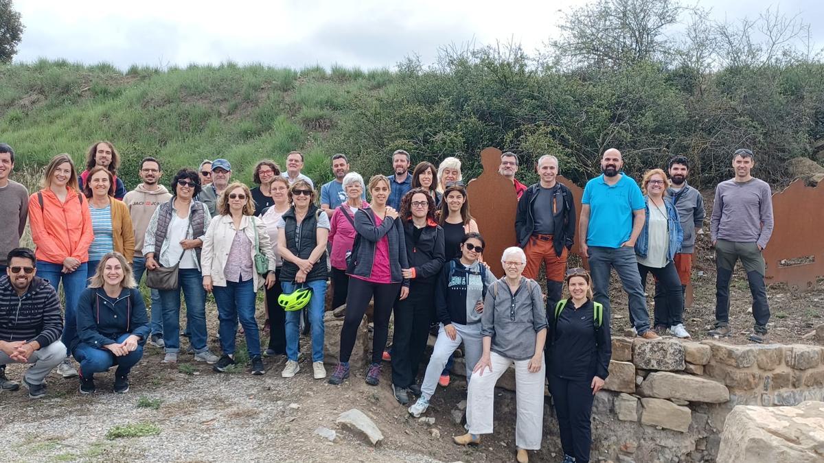 Els propietaris dels comerços implicat en el turisme de l'Anoia durant la visita a Calaf i Calonge de Segarra