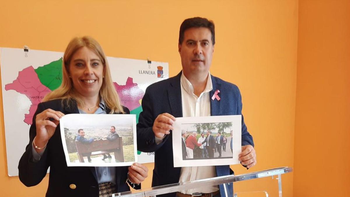 Nuria Niño y Silverio Argüelles, en la sede del PP llanerense, con dos fotos de la visita de Barbón al concejo el pasado lunes. | L. Palacios