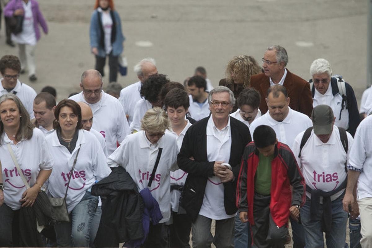 Xavier Trias arriba a Montjuïc en la seva caminada amb seguidors de CiU.