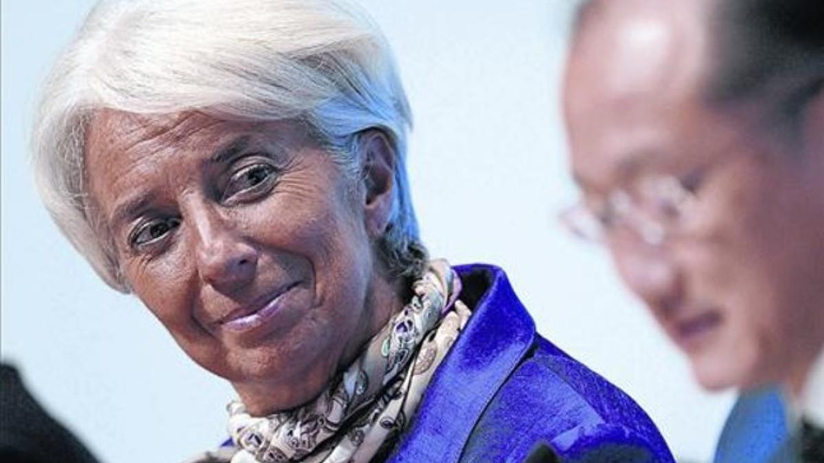 Christine Lagarde y el presidente del Banco Mundial, Jim Yong Kim, ayer en Tokio.