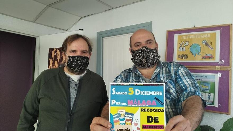 Antonio Paneque y un colaborador de OSAH, este lunes con el cartel de la campaña del sábado 5.