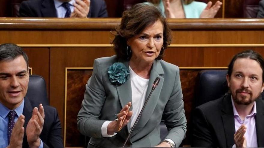 El presidente del Gobierno, Pedro Sánchez, la vicepresidenta Carmen Calvo y el vicepresidente Pablo Iglesias, en el Congreso.