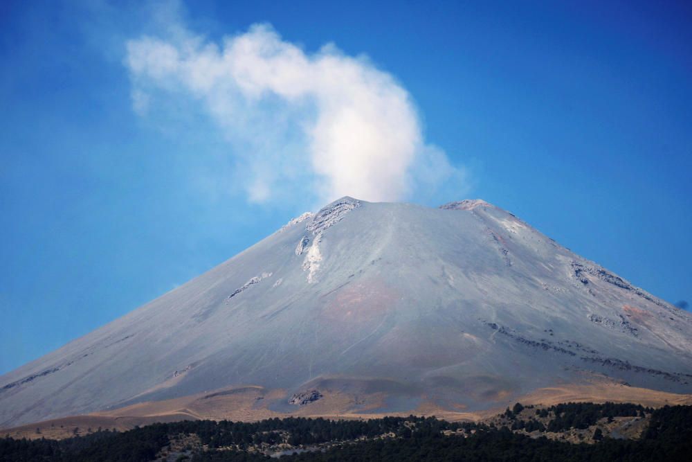 A general view shows the Popocatepetl volcano as ...