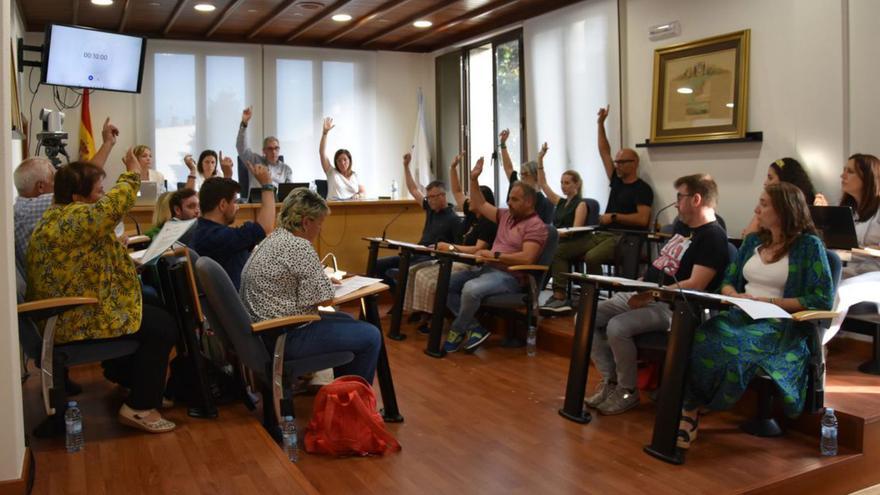 Votación conjunta del PP y PSOE en el pleno de Ames que aprobó salarios