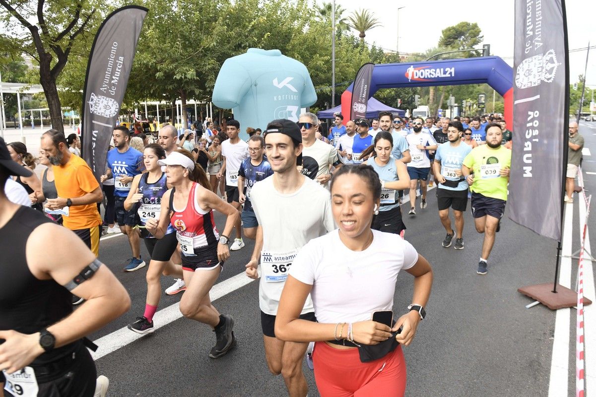 La carrera y marcha Solidaria Asteamur, en imágenes