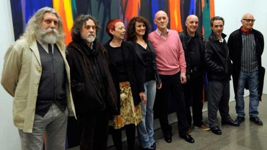 Los miembros de Abra, en la apertura de la muestra en el edificio histórico de la Universidad.