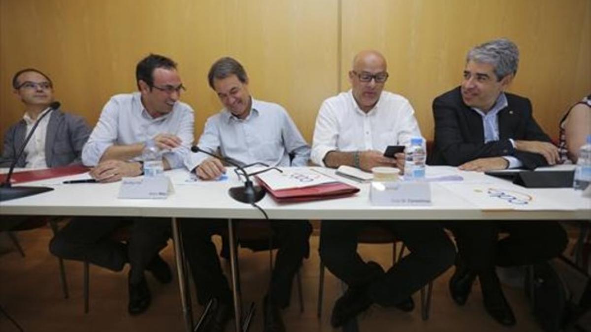 Josep Rull, Artur Mas, Lluís Corominas y Francesc Homs, en la ejecutiva de CDC.