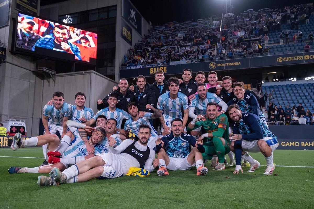 El Málaga CF celebrando en el JP Financial la victoria.