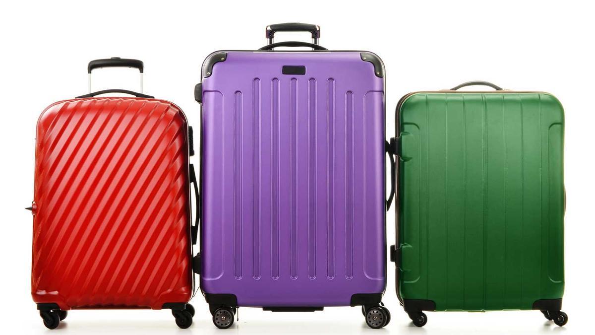 Three suitcases isolated on white