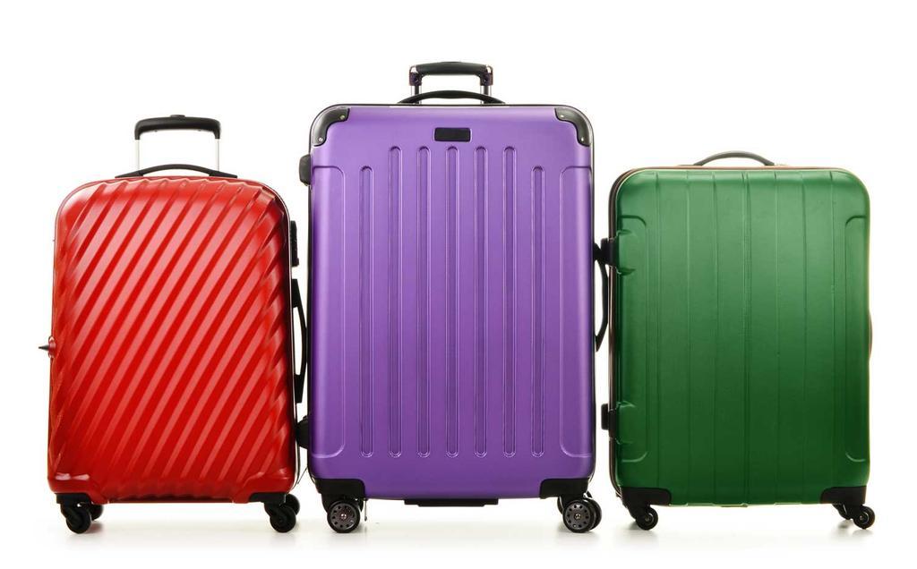 Three suitcases isolated on white