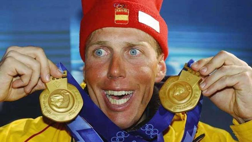 Muehlegg, con dos de sus medallas en 2002.