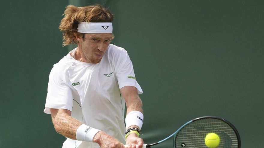 Andrey Rublev of Russia returns to Lloyd Harris of South Africa during their second round men's singles match at the Wimbledon Tennis Championships in London, Wednesday, July 2, 2025. (AP Photo/Joanna Chan)