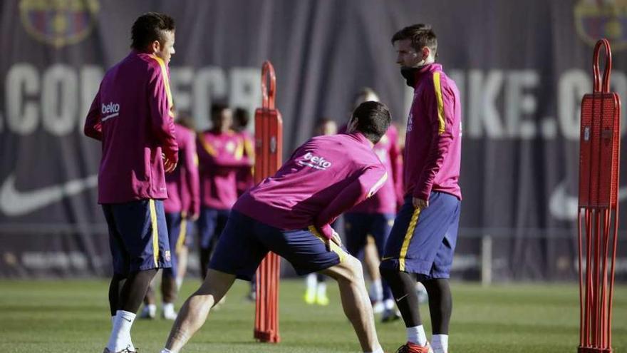 Messi, Neymar y Luis Suárez, en el entrenamiento de ayer en Sant Joan D&#039;Espí. // Alberto Estévez