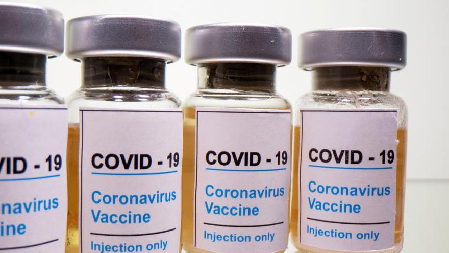 Vials amb una etiqueta adhesiva, COVID-19