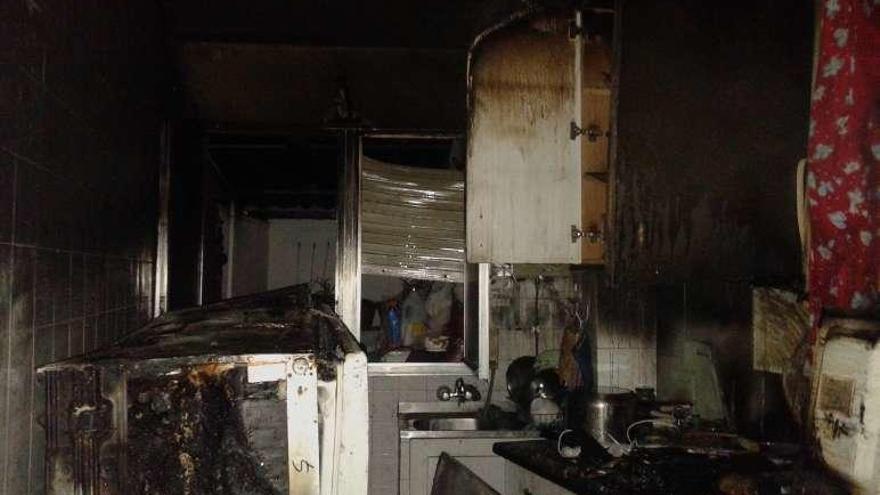 Estado en el que quedó la cocina incendiada.