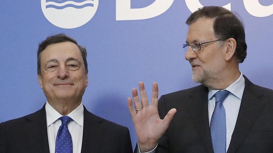 Mario Draghi junto a Mariano Rajoy.