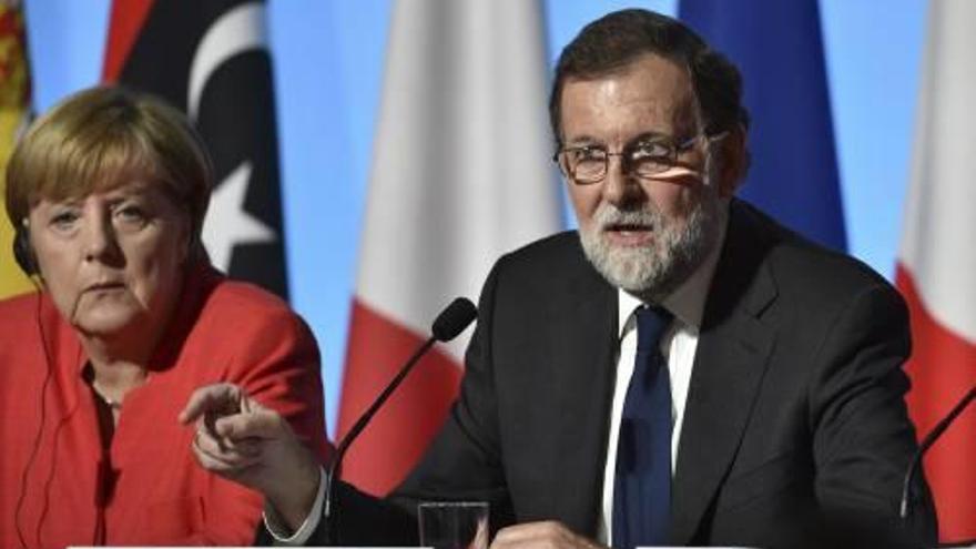 Rajoy, a la roda de premsa al costat de Merkel.