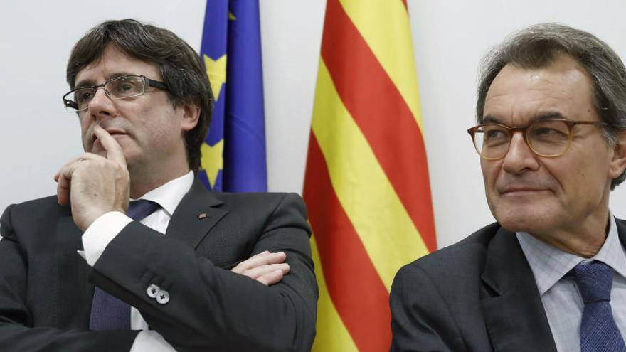Carles Puigdemont i Artur Mas, presideixen el Comitè Nacional del PdeCat.