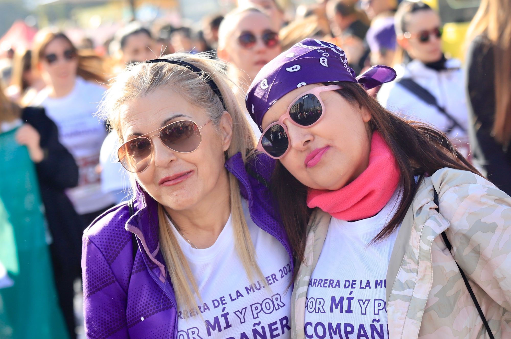 La salida y el recorrido de la Carrera de la Mujer 'inmortalizados' en imágenes