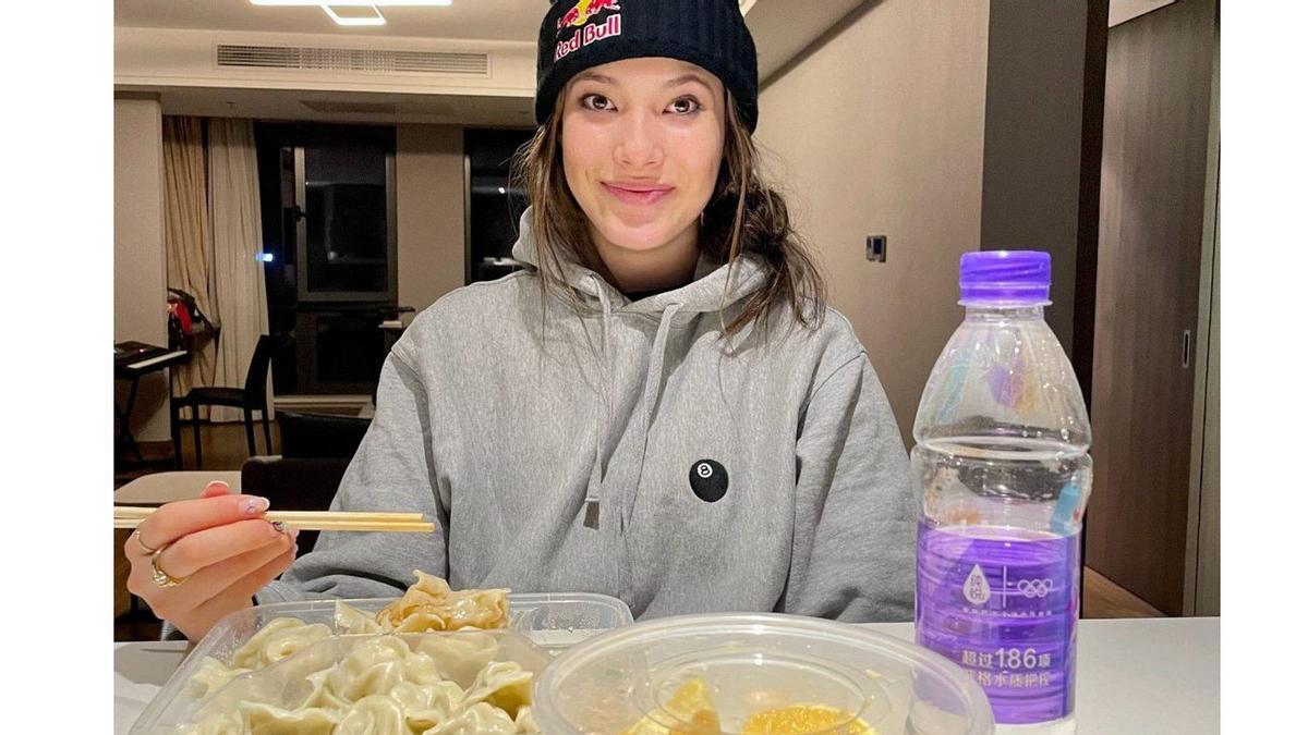 Eileen Gu eats dumplings in a Beijing restaurant