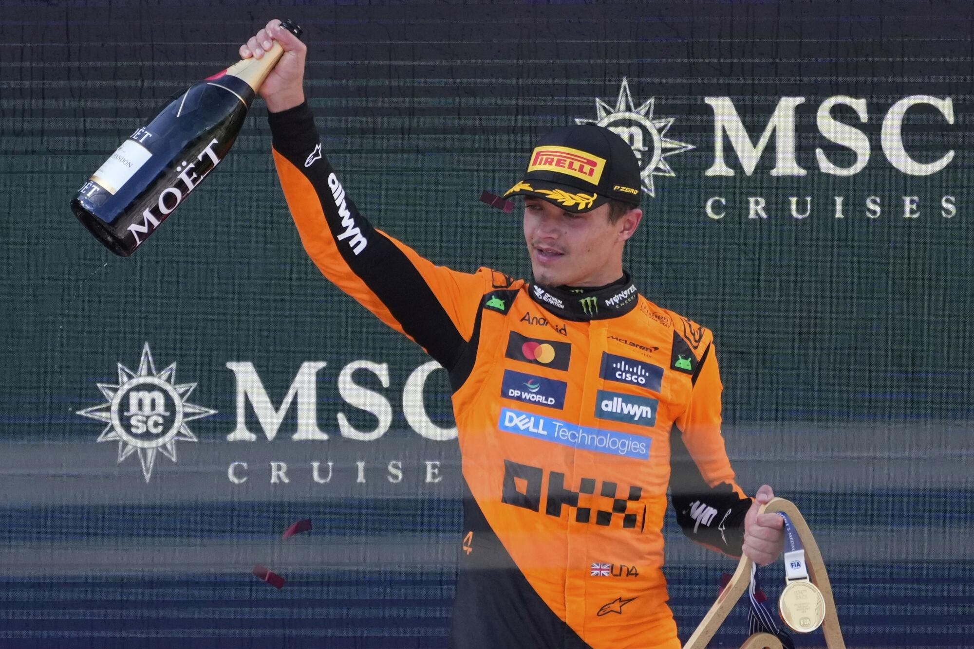 McLaren driver Lando Norris of Britain celebrates after winning the Austrian Formula One Grand Prix in Spielberg, Austria, Sunday, June 29, 2025. (AP Photo/Darko Bandic)