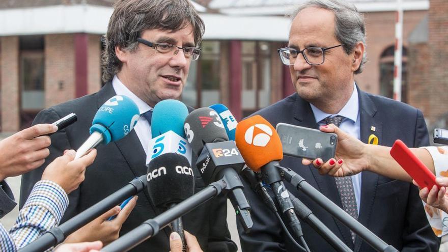 Carles Puigdemont y Quim Torra.