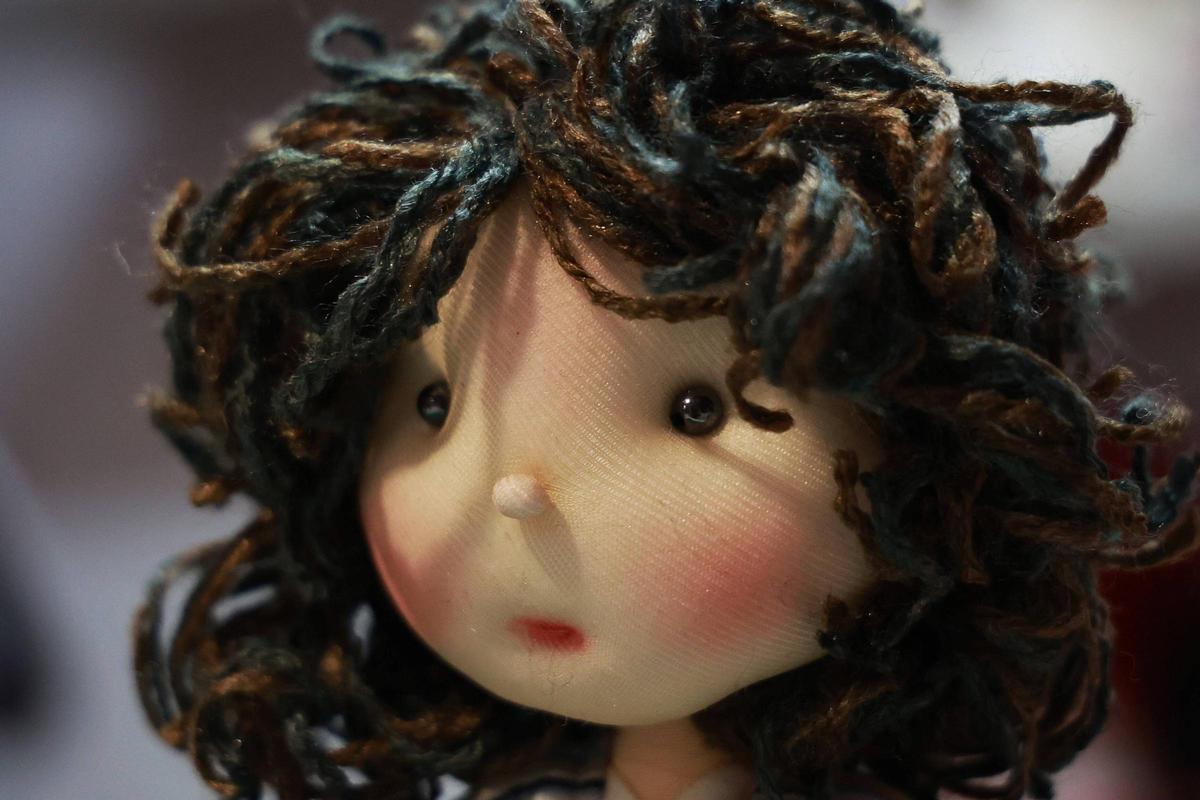Detalles del muñeco de tela de Robe.