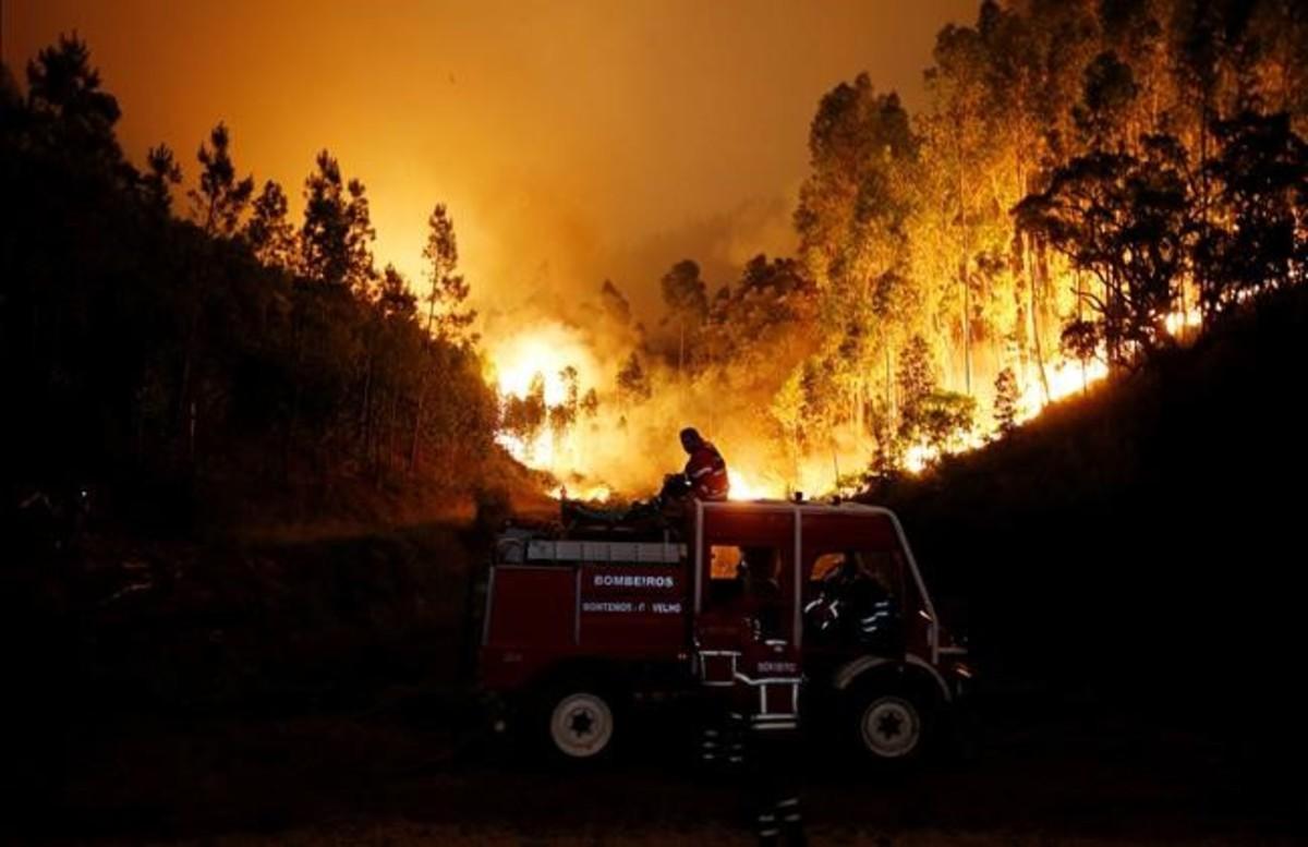 abertran38938774 firefighters work to put out a forest fire near bouca  in ce170618115756