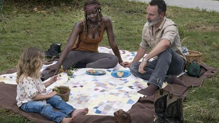 Rick, Michonne y Judith.