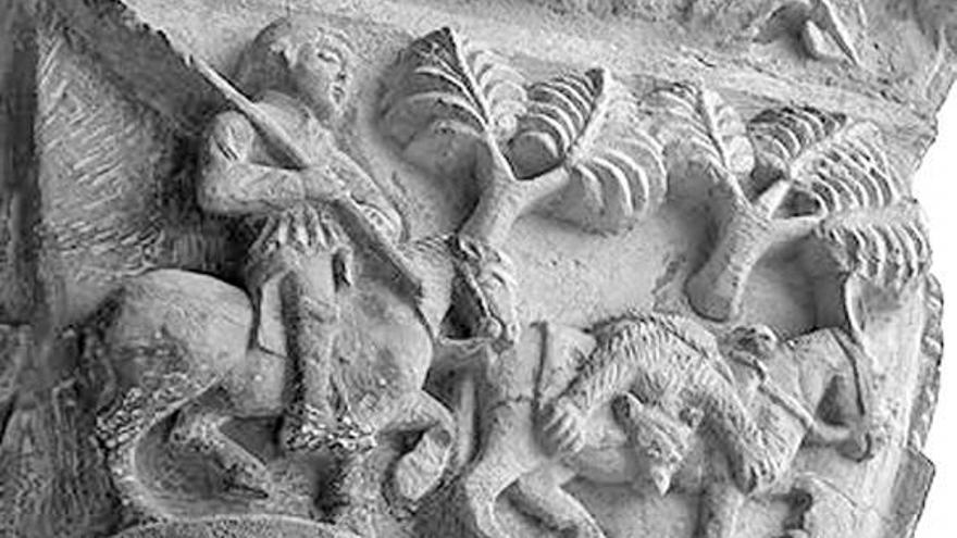 Capitel románicu nel que se representa un osu cazáu sobre una caballería.