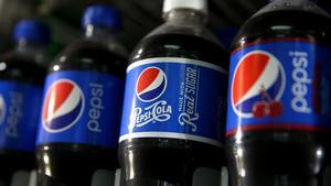 (FILES) This file photo taken on July 9, 2015 shows bottles of Pepsi displayed in a cooler at a convenience store in San Francisco, California.