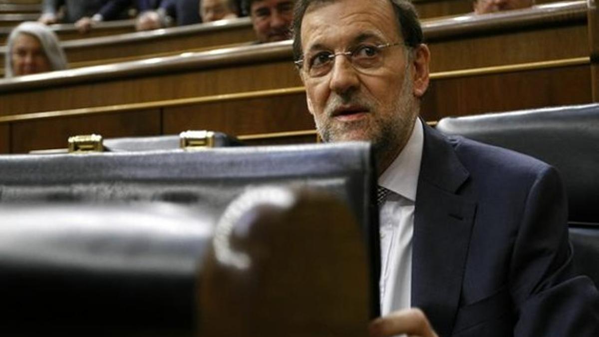 Rajoy, en la bancada del Congreso, antes de su intervención.