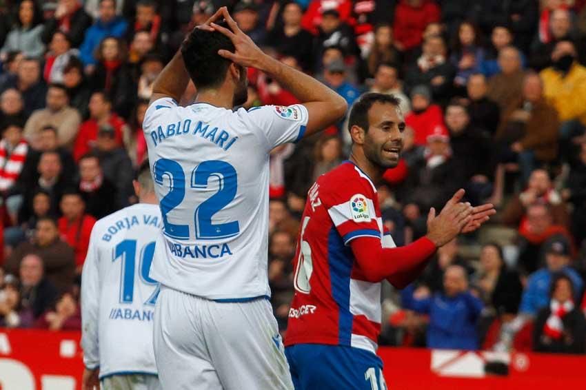 El Deportivo consigue en Granada la trascendental victorial para las aspiraciones blanquiazules al final de temporada.