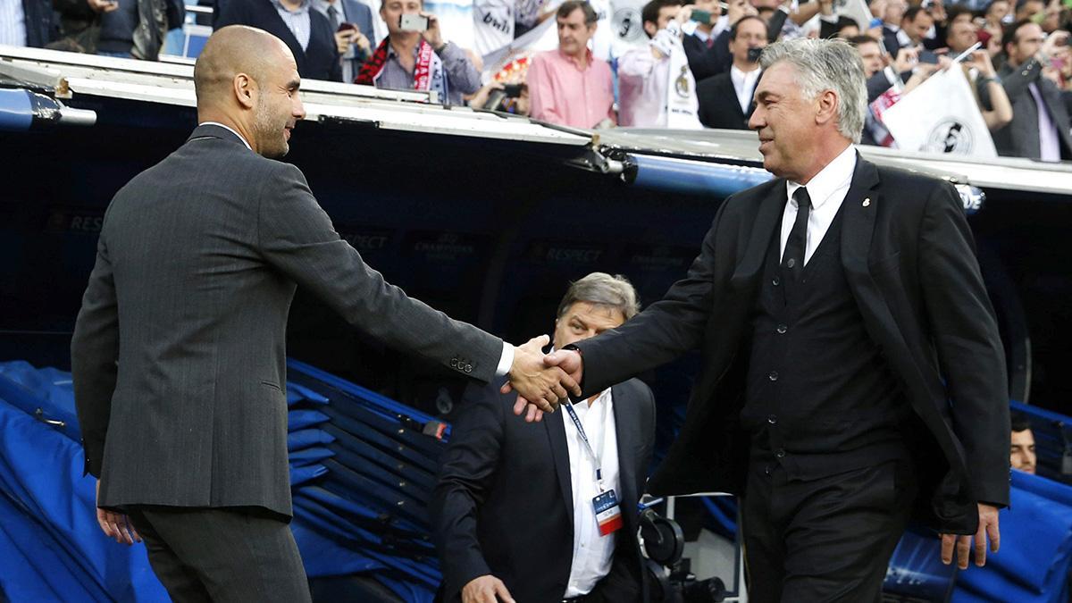 Pep Guardiola y Carlo Ancelotti se saludan
