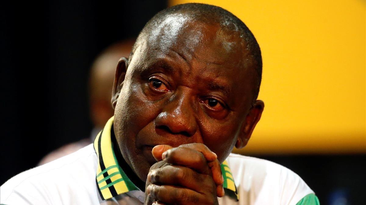 undefined41354835 deputy president of south africa cyril ramaphosa reacts afte171218190125
