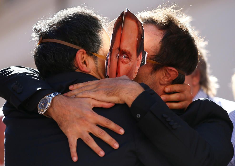 5-Star Movement supporters kiss each others as ...