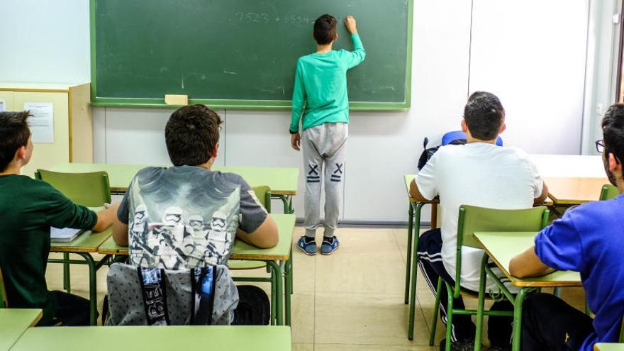 Alumnos durante una clase, en imagen de archivo.