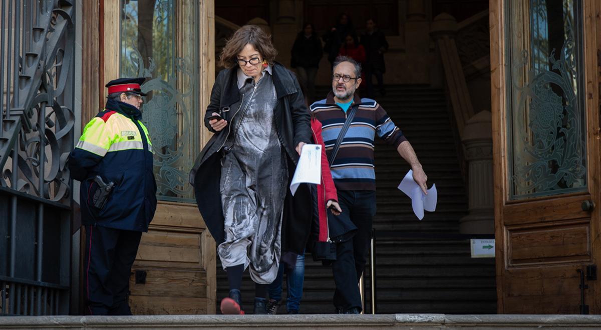 Eulàlia Reguant y Antonio Baños a la salida del TSJC 